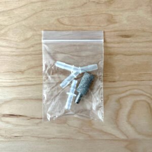 2 plastic connectors and stone